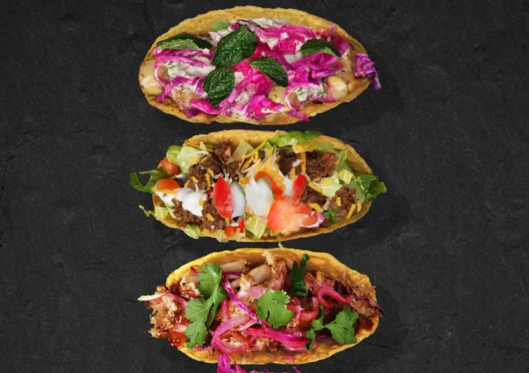 Colorful tacos on crispy shells with fresh toppings, showcasing Lime Fresh Taco Franchise flavors